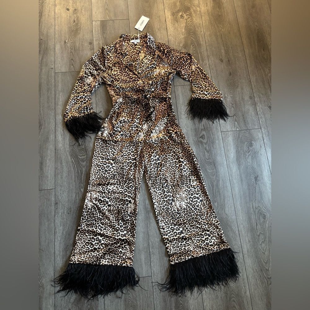 Likely Lawrence  jump suit very cute! Lightweight with ostrich feathers